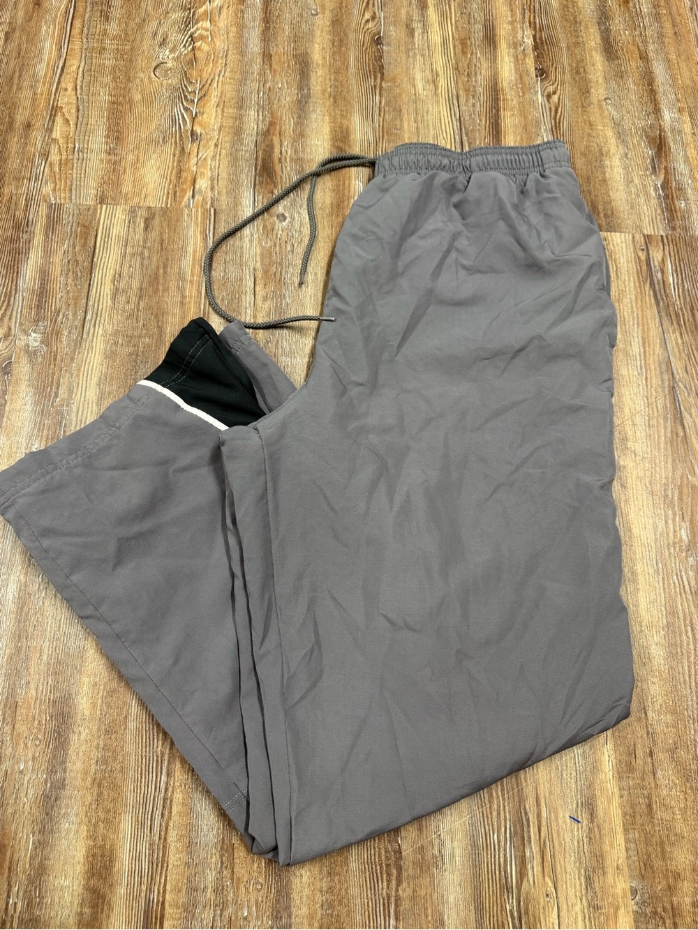 Vintage Y2K Gray wide leg baggy Reebok track pants with black side panels and wh